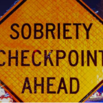 Warning sign: Sobriety Checkpoint Ahead