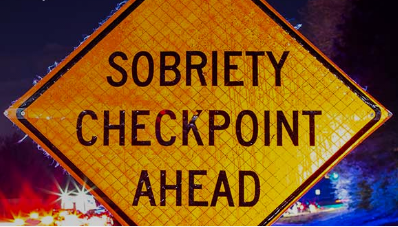 Warning sign: Sobriety Checkpoint Ahead